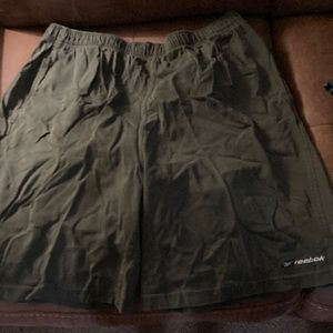 Green Reebok gym shorts.